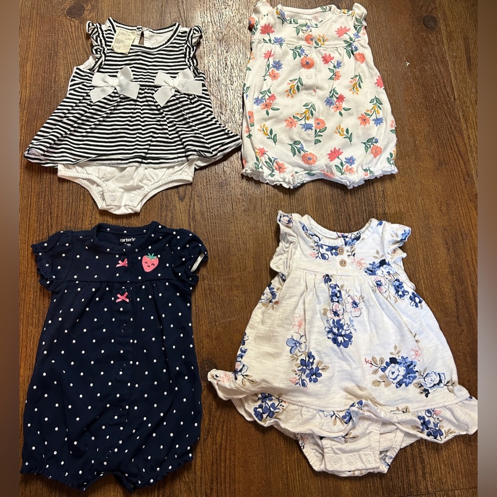 Four Rompers - Picture 1 of 7